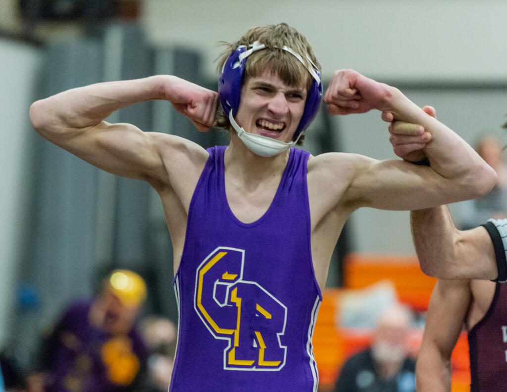 Columbia River's Tennyson Kurtz celebrates his 138-pound championship in the 2A Region 3 Wrestling Tournament on Saturday, Feb. 12, 2022, at Washougal High School.