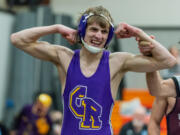 Columbia River's Tennyson Kurtz celebrates his 138-pound championship in the 2A Region 3 Wrestling Tournament on Saturday, Feb. 12, 2022, at Washougal High School.