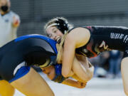 Union's Niah Cassidy grapples with Walla Walla's Kylie-May Kemp in a second-round victory at Mat Classic XXXIII on Friday, Feb. 18, at the Tacoma Dome.