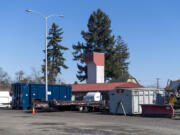 The Tower Plaza tower overlooks the former Golden Skate property and proposed site for Vancouver's second Safe Stay Community on Wednesday. Dice Age Games owner Roy Starkweather said property owners within 1,200 feet of the site were invited to tour the original supportive site to see how it's operated.