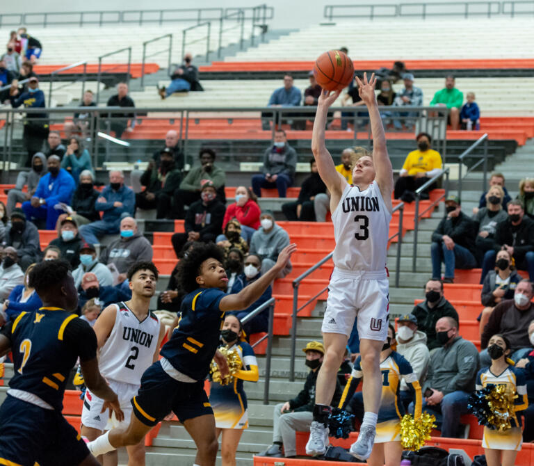 Union's Bryson Metz rises up for a 3-pointer in a WIAA State Regional basketball game on Saturday, Feb. 26, 2022, at Battle Ground High School.