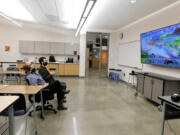 Ridgefield High School's speech and debate team members continued competing against each other by playing video games during their down time.