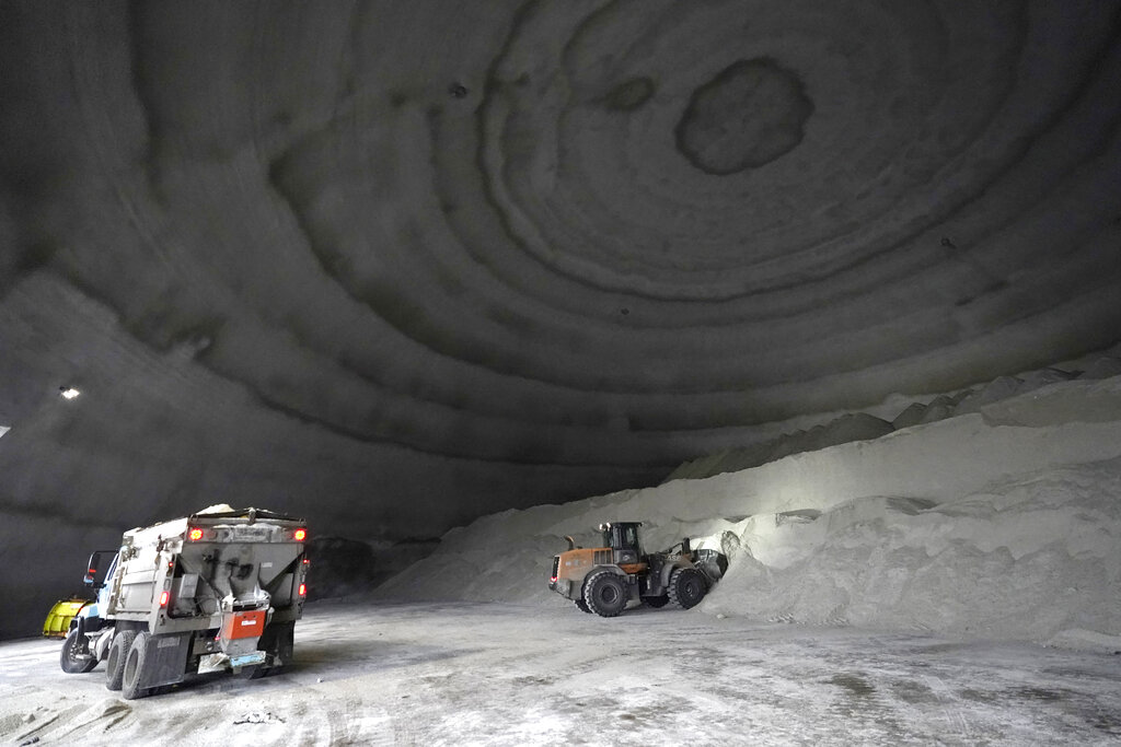 A City of Chicago Department of Streets and Sanitation salt truck waits for a load in a city salt dome in anticipation of a winter storm Tuesday, Feb. 1, 2022, in Chicago. A major winter storm is expected to affect a huge swath of the United States beginning Tuesday, with heavy snow starting in the Rockies and freezing rain as far south as Texas before it drops snow and ice on the Midwest.