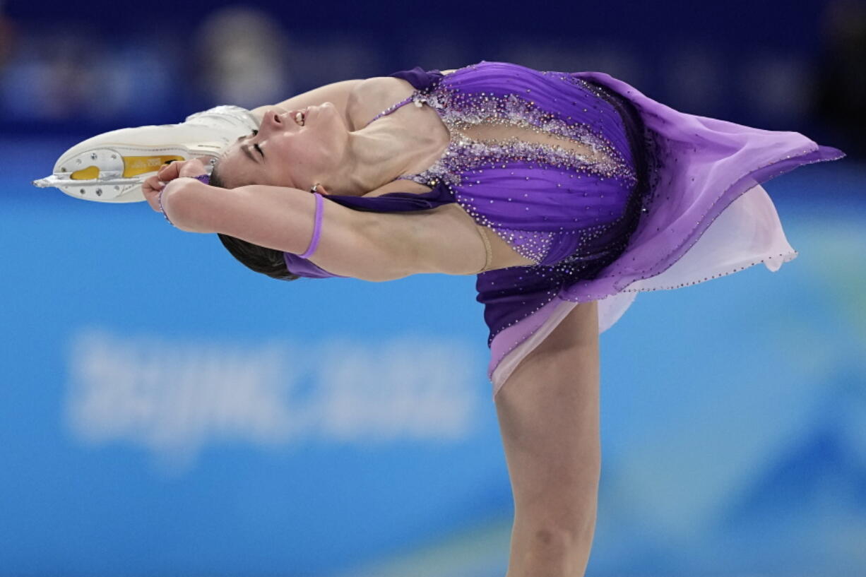 Kamila Valieva, of the Russian Olympic Committee, competes in the women's short program during the figure skating at the 2022 Winter Olympics, Tuesday, Feb. 15, 2022, in Beijing. (AP Photo/David J.