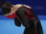 Kamila Valieva, of the Russian Olympic Committee, reacts after the women's free skate program during the figure skating competition at the 2022 Winter Olympics, Thursday, Feb. 17, 2022, in Beijing.