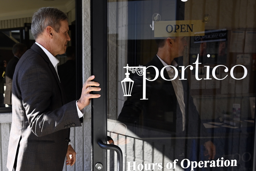 Tennessee Gov. Bill Lee enters the Portico Crisis Pregnancy Center for a tour Jan. 26, 2022, in Murfreesboro, Tenn. The privately operated crisis pregnancy centers are funded with taxpayer dollars and steer women away from abortions but provide little if any health care services. The centers have opened in about a dozen states with restrictive abortion laws.