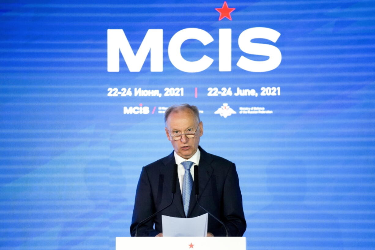 FILE - Russia's security council secretary Nikolai Patrushev delivers his speech at the IX Moscow conference on international security in Moscow, Russia, on June 24, 2021. With all eyes on a possible Russia invasion of Ukraine, Russian President Vladimir Putin is sending his top security envoy to the Balkans where Moscow has been trying to maintain influence mainly through its ally Serbia. Serbia's pro-government media said Monday Nikolai Patrushev, the powerful secretary of the Kremlin's Security Council, is due to arrive in Belgrade next week for talks with Serbia's President Aleksandar Vucic.