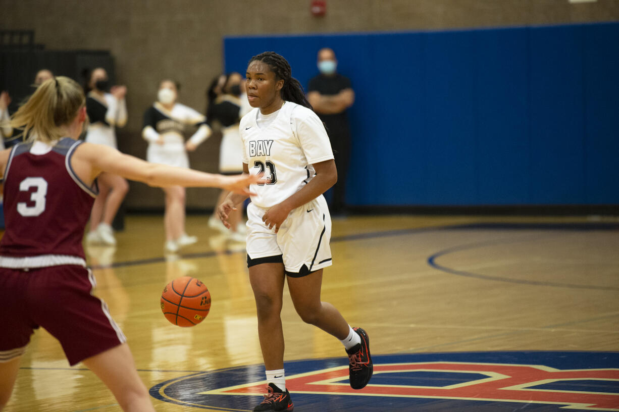 Hudson's Bay senior Aniyah Hampton dribbles down court during the Eagles' 33-30 win over W.F. West in the 2A girls basketball district semifinal.