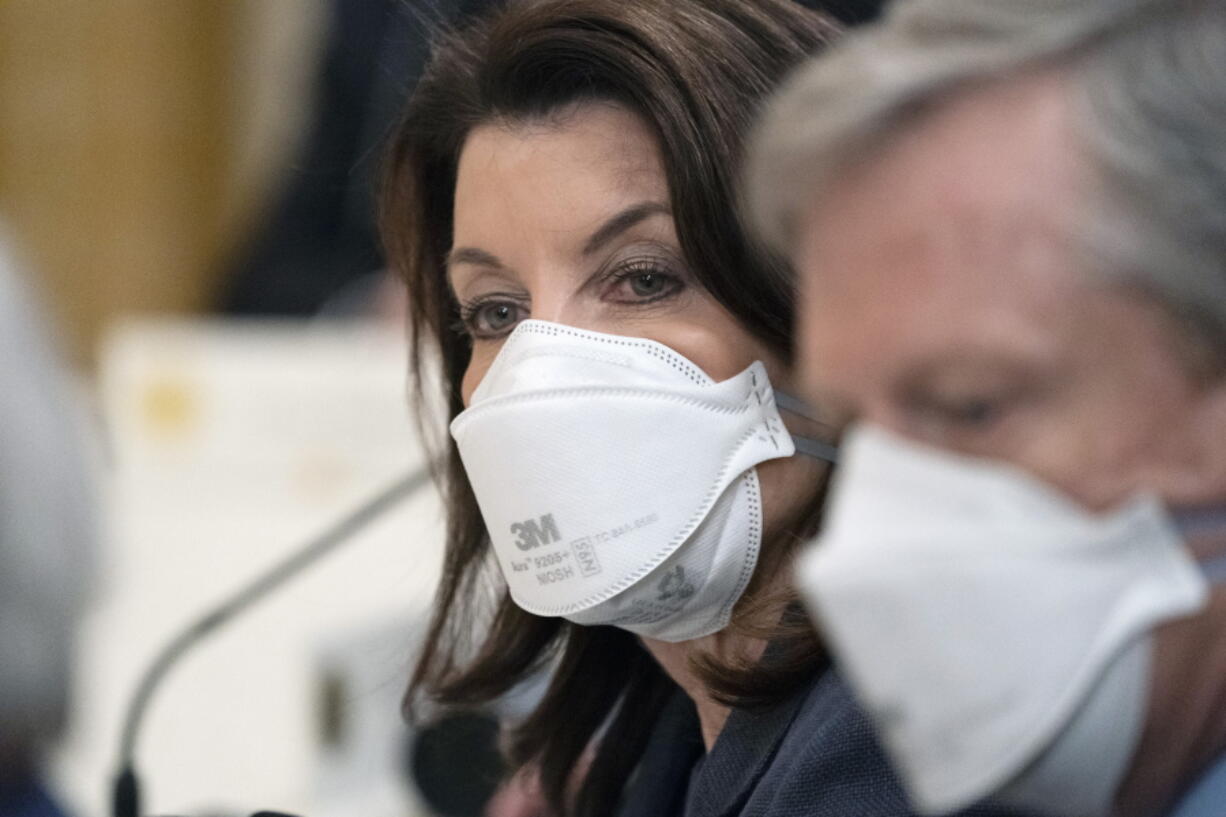 Gov. Kathy Hochul, D-N.Y., listens as President Joe Biden speaks during a meeting with the National Governors Association in the East Room of the White House, Monday, Jan. 31, 2022, in Washington.