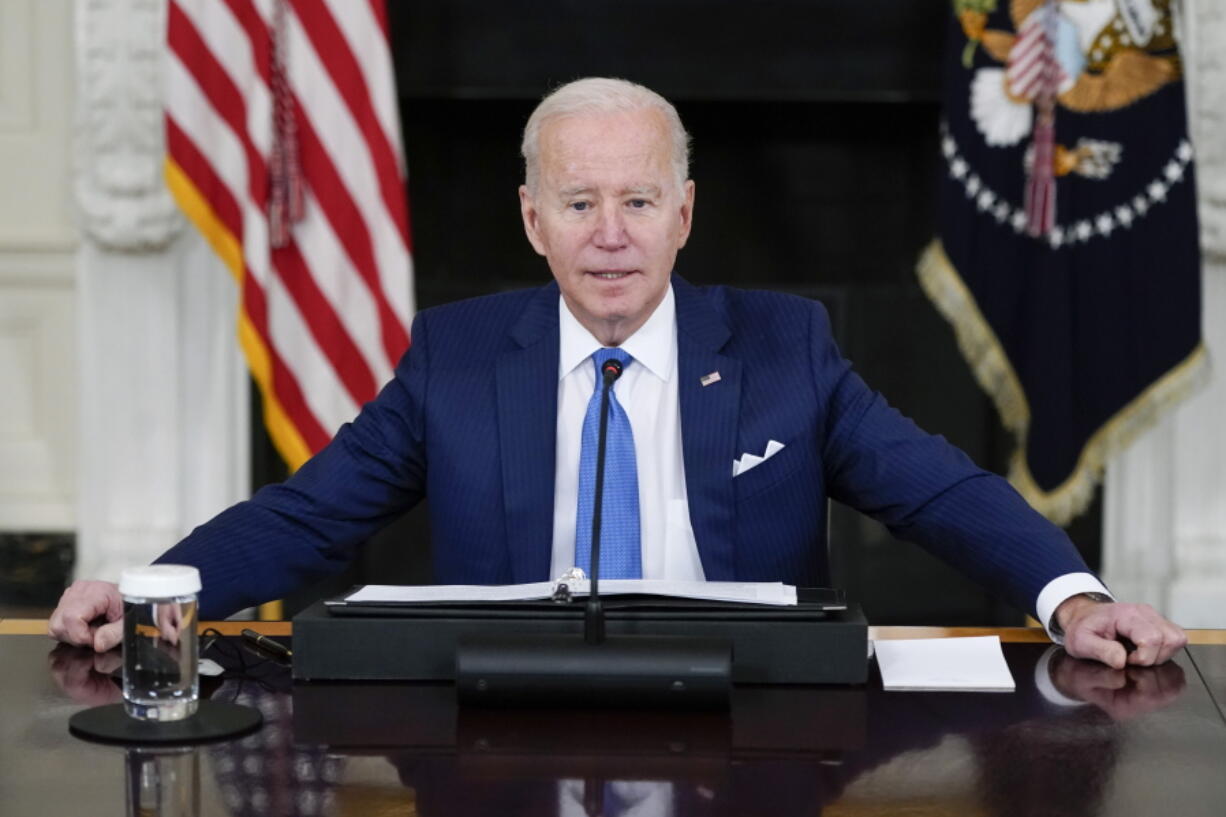 President Joe Biden speaks during a roundtable meeting with CEOs of electric utilities in the State Dining Room of the White House, Wednesday, Feb. 9, 2022, in Washington. Biden is trying to jump-start progress on his stalled domestic agenda by refocusing attention on one of his most popular proposals, limiting the cost of prescription drugs. Biden is traveling to Virginia on Thursday to call attention to what the White House says is the "unacceptable" cost of medications.