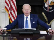 President Joe Biden speaks during a roundtable meeting with CEOs of electric utilities in the State Dining Room of the White House, Wednesday, Feb. 9, 2022, in Washington. Biden is trying to jump-start progress on his stalled domestic agenda by refocusing attention on one of his most popular proposals, limiting the cost of prescription drugs. Biden is traveling to Virginia on Thursday to call attention to what the White House says is the "unacceptable" cost of medications.