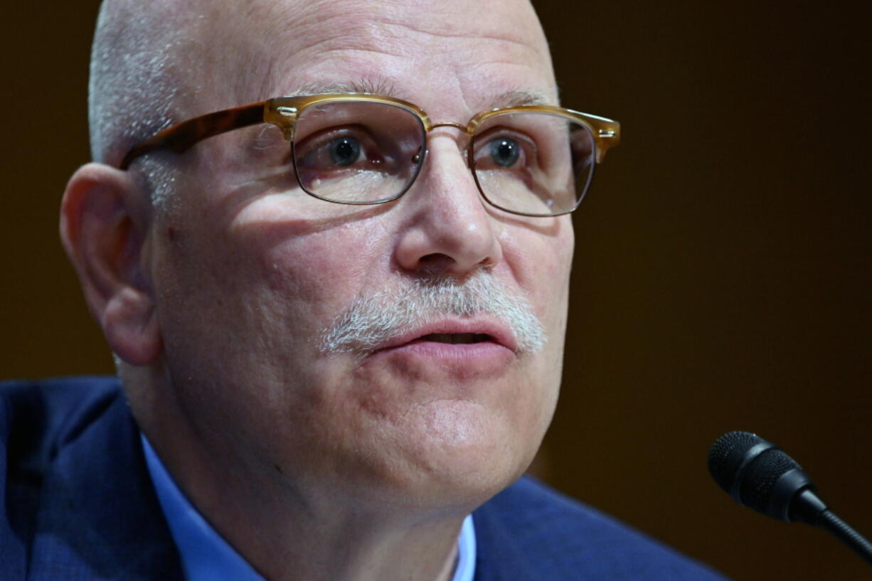 FILE - Chris Magnus testifies before the Senate Finance Committee on his nomination to be the next U.S. Customs and Border Protection commissioner, Oct. 19, 2021, on Capitol Hill in Washington. Magnus has many challenges to overcome in his new role as commissioner of U.S. Customs and Border Protection. In an interview on Feb. 8, 2022, with The Associated Press, Magnus acknowledged morale problems within the nation's largest law enforcement agency but offered no quick answers to the heavy migration flow to the U.S., which attracts more asylum seekers than any other country.