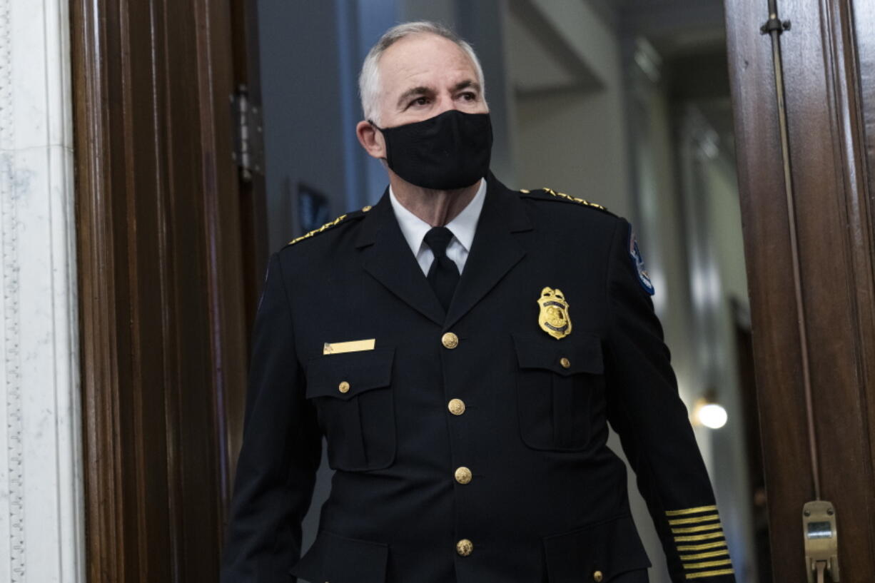 FILE - U.S. Capitol Police Chief Tom Manger arrives to testify at a Senate Rules and Administration Committee oversight hearing on the Jan. 6, 2021, attack on the Capitol, Jan. 5, 2022, in Washington. U.S. Capitol Police officers are facing increasingly heated rhetoric from House Republicans as it tries to win back public confidence, including baseless allegations that the department's officers are operating as politically driven spies.