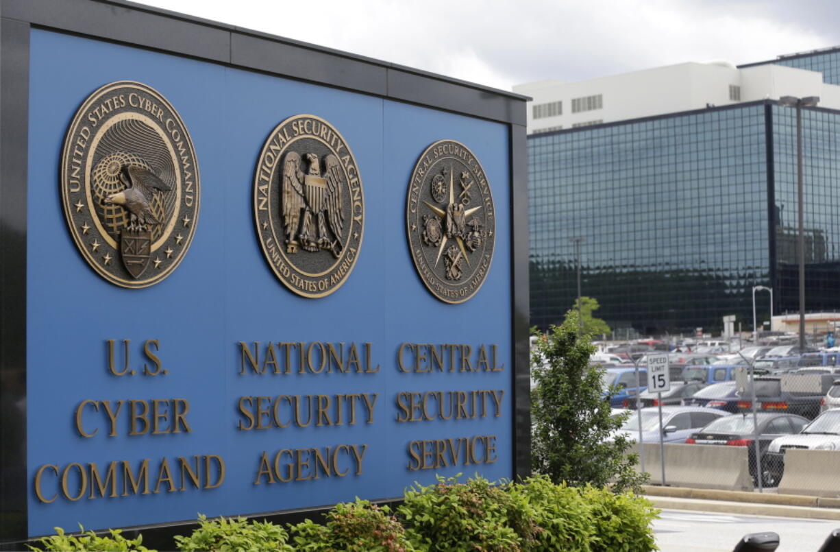 FILE - The sign outside the National Security Administration (NSA) campus where U.S. Cyber Command is located in Fort Meade, Md., June 6, 2013. Tensions are soaring over Ukraine with Western officials warning about the danger of Russia launching major cyberattacks against its NATO allies.