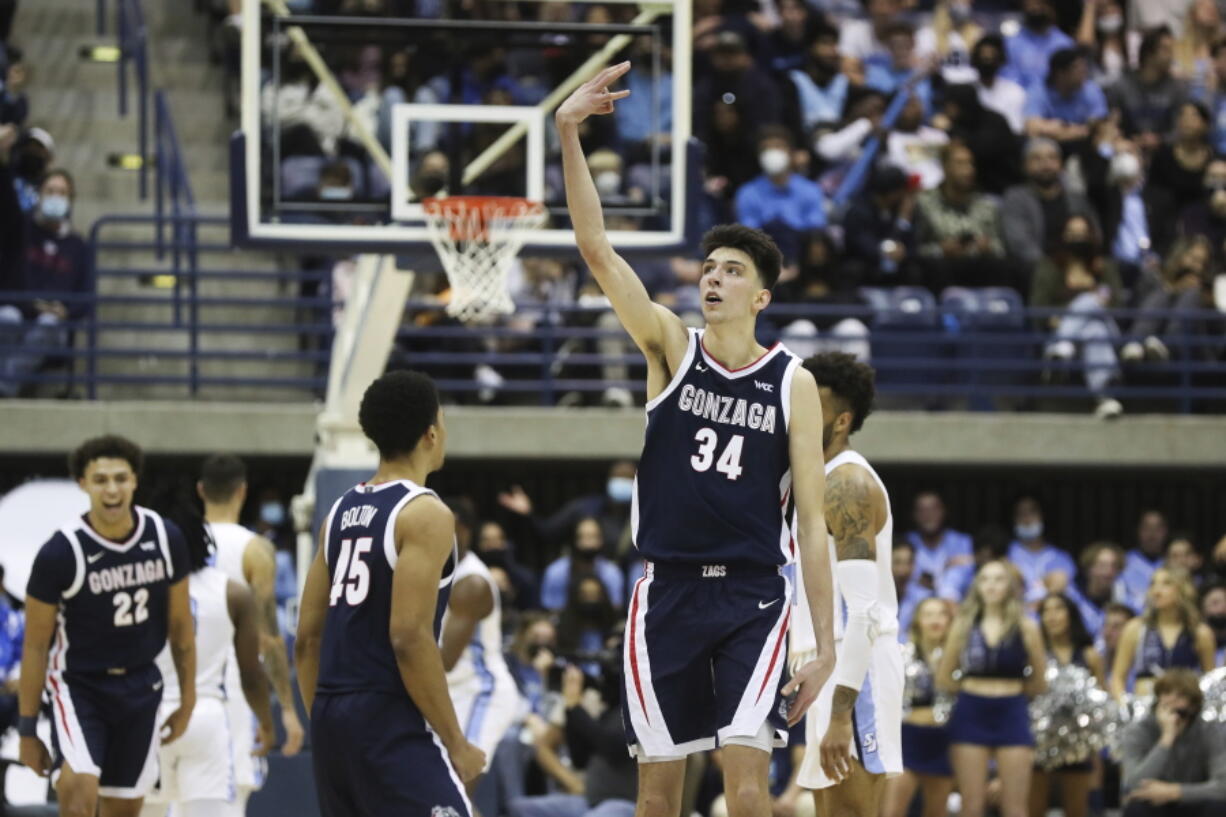 Gonzaga center Chet Holmgren (34) celebrates after making a three-point basket against San Diego during an NCAA college basketball game Thursday, Feb. 3, 2022, in San Diego.