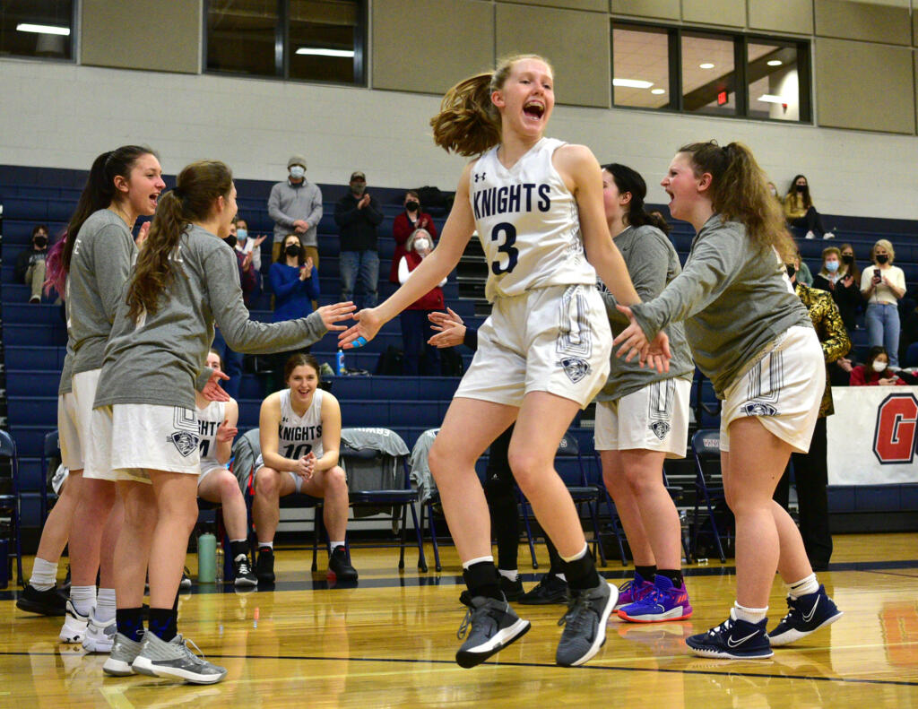 King’s Way freshman Bridget Quinn yells during pregame introductions Friday, Feb. 4, 2022, before the Knights’ 45-40 win against La Center at King’s Way Christian High School.