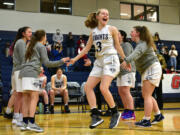 King’s Way freshman Bridget Quinn yells during pregame introductions Friday, Feb. 4, 2022, before the Knights’ 45-40 win against La Center at King’s Way Christian High School.