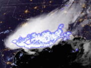 This satellite image provided by the National Oceanic and Atmospheric Administration shows a thunderstorm complex which was found to contain the longest single flash that covered a horizontal distance on record, at around 768 kilometers (477 miles) across parts of the southern United States on April 29, 2020. Two stormy parts of the Americas set records for longest lightning flashes back in 2020, the World Meteorological Organization said Monday, Jan. 31, 2022.