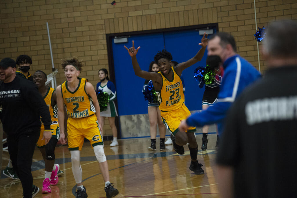 Evergreen's Arthur Ban (23) and Robert Lawrence (2) celebrate after Evergreen beat Mountain View in Saturday's 3A winner-to-state playoff at Mountain View.