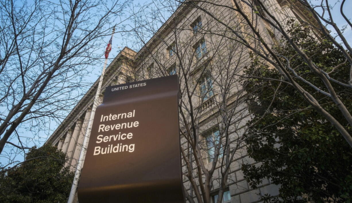 FILE - This April 13, 2014, file photo shows the Internal Revenue Service (IRS) headquarters building in Washington. On Friday, Feb. 4, 2022, The Associated Press reported on stories circulating online incorrectly claiming The IRS will issue a fourth round of stimulus checks to Americans in February 2022. (AP Photo/J.