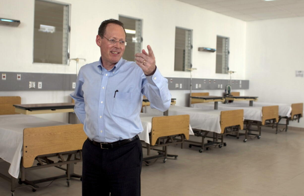 In this picture taken Jan. 10, 2012, Partners in Health's co-founder, Dr. Paul Farmer, gestures during the inauguration of national referral and teaching hospital in Mirebalais, 30 miles (48 kilometers) north of Port-au-Prince, Haiti. Dr. Paul Farmer, a physician, humanitarian and author renowned for providing health care to millions of impoverished people, has died. He was 62. Farmer co-founded the global nonprofit Partners in Health, which confirmed his death Monday, Feb. 21, 2022.