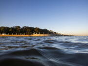 High tide laps against the sea wall at The Battery in Charleston, S.C., in November 2020.