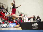 Camas sophomore Hallie Kempf performs her floor exercise routine at the 4A state gymnastics meet at Sammamish High School in Bellevue on Saturday, Feb. 26, 2022.