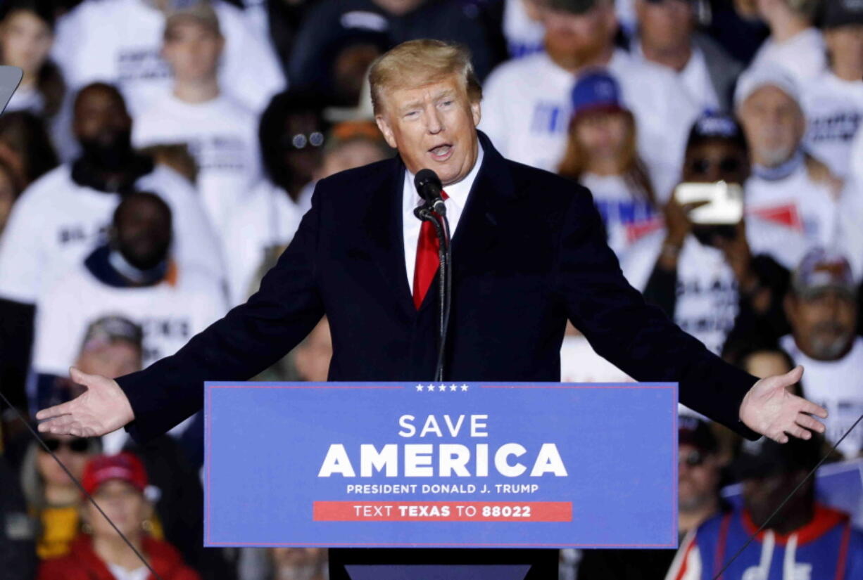 Former President Donald Trump speaks at a rally, Saturday, Jan. 29, 2022, in Conroe, Texas.