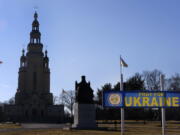 A sign outside St. Andrew Ukrainian Orthodox Memorial Church in South Bound Brook, N.J., reads, "Pray for Ukraine," Wednesday, Feb. 9, 2022. Religious leaders and members of the Ukrainian diaspora in the United States are growing increasingly alarmed over the threat of a Russian invasion to Ukraine and have stepped efforts to help their family members back home.