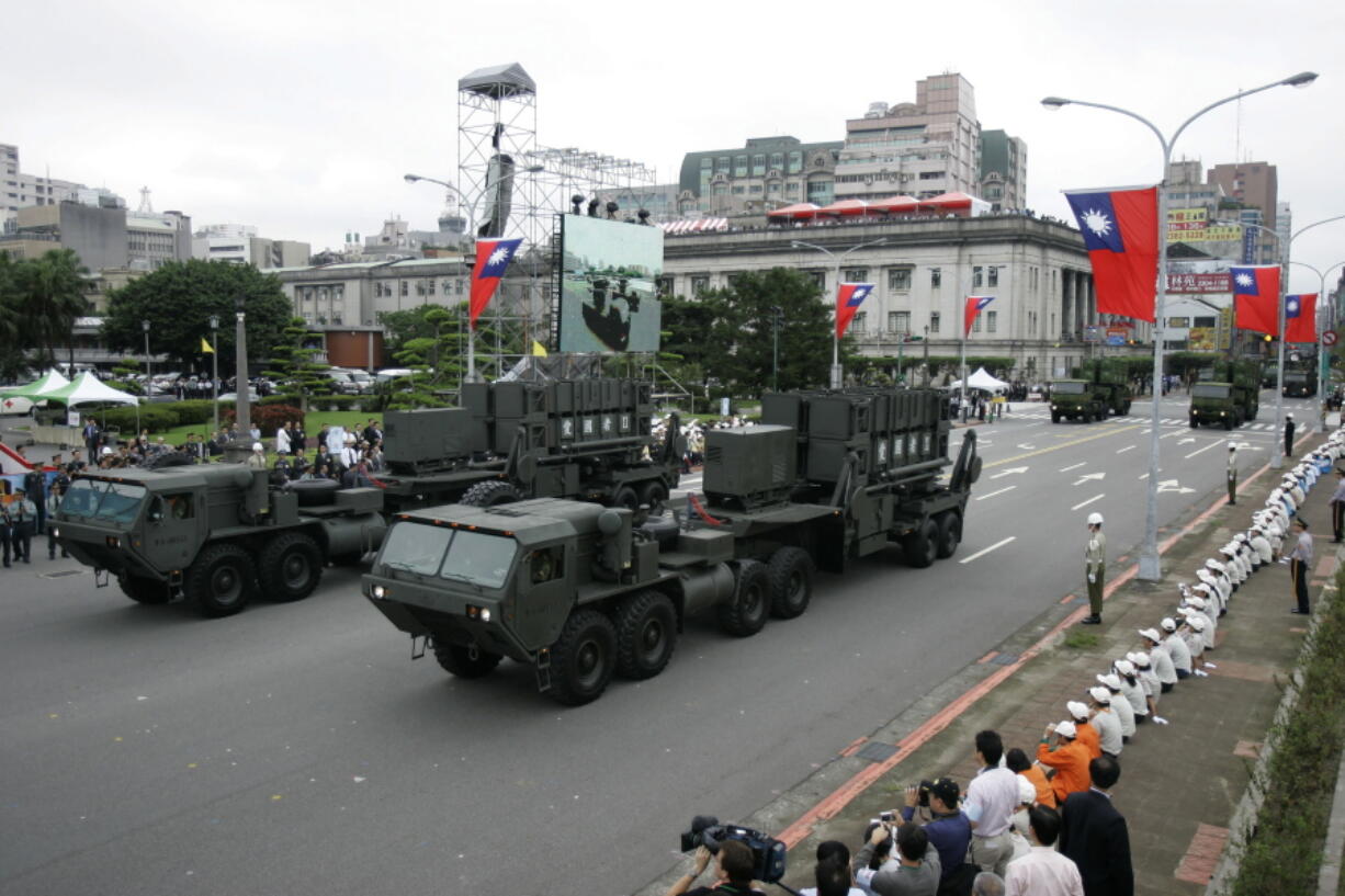 FILE - Taiwan's U.S.-made Patriot surface to air missile batteries pass during the Republic of China National Day parade in Taipei, Taiwan on Oct. 10, 2007. The Biden administration has approved a $100 million support contract with Taiwan aimed at boosting the island's missile defense systems as it faces increasing pressure from China.