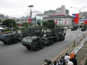 FILE - Taiwan's U.S.-made Patriot surface to air missile batteries pass during the Republic of China National Day parade in Taipei, Taiwan on Oct. 10, 2007. The Biden administration has approved a $100 million support contract with Taiwan aimed at boosting the island's missile defense systems as it faces increasing pressure from China.