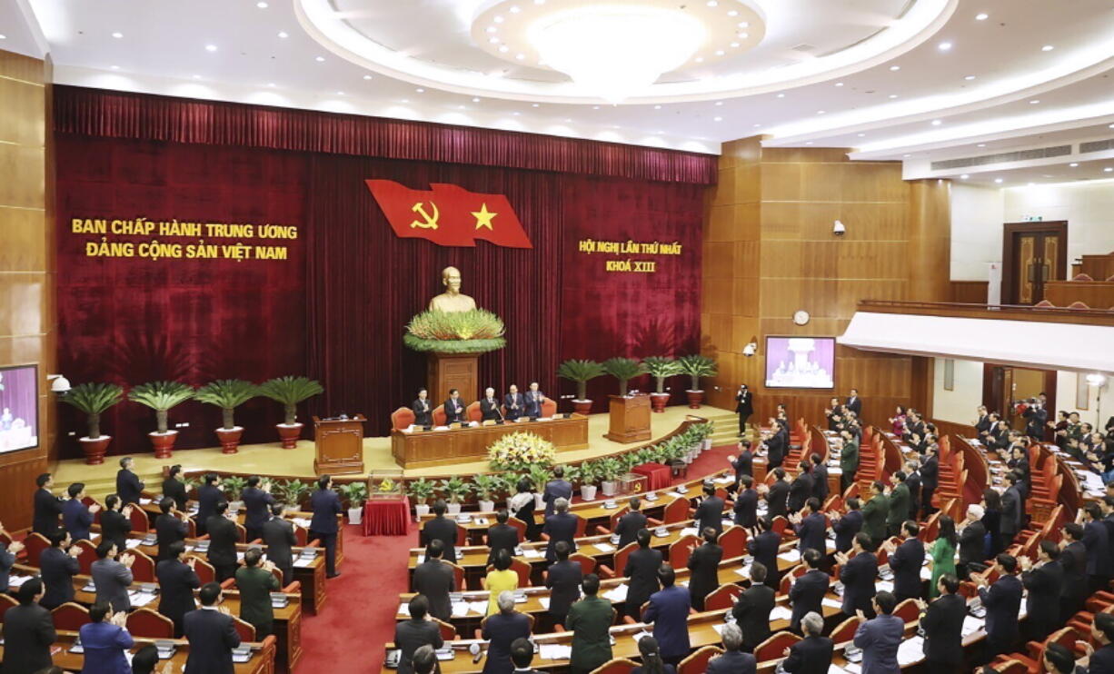 FILE - Vietnam Communist party central committee holds a meeting in Hanoi, Vietnam, Jan. 31, 2021. Vietnam's Communist government routinely obstructs people's movement and conducts other extrajudicial harassment including house arrest in its systematic repression of civil and political rights, Human Rights Watch said in a report Thursday, Feb. 17, 2022.