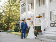 Shelley Kapitulik-Jaye and Stephen Jaye have a quiet moment on their wedding day, Oct. 20, in Norwalk, Conn. The two wed on a Wednesday, tapping into a trend of couples choosing weekdays for their weddings, by either choice or necessity.