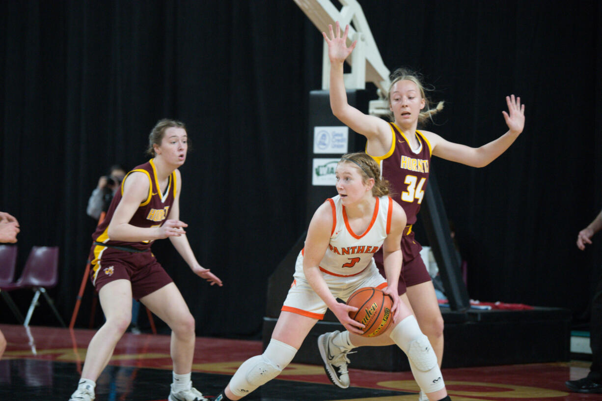 Washougal forward Savea Mansfield looks to pass during a Class 2A state playoff game against White River on Wednesday in Yakima (Micah Rice/The Columbian)