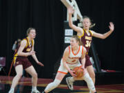 Washougal forward Savea Mansfield looks to pass during a Class 2A state playoff game against White River on Wednesday in Yakima (Micah Rice/The Columbian)