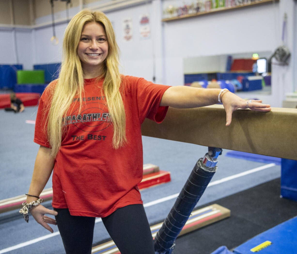 Camas High School gymnast Hallie Kempf stands for a portrait Tuesday, March 8, 2022, at Vancouver Elite Gymnastics Academy.