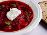 Borsch topped with a dollop of sour cream and dill. (Colter Peterson/St.