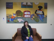 Amy Russell, executive director of the Children's Justice Center, is pictured in the lobby of the downtown offices March 17, 2017.