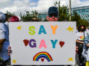 Members and supporters of the LGBTQ community attend the "Say Gay Anyway" rally in Miami Beach, Florida, on March 13, 2022. Florida's state senate on March 8 passed a controversial bill banning lessons on sexual orientation and gender identity.