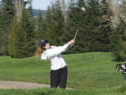 Union golfer Jade Gruher hits an approach shot onto the sixth green at Camas Meadows Golf Club on Thursday, March 24, 2022.