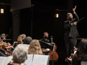 Maestro Salvador Brotons leads the Vancouver Symphony Orchestra during an educational concert for third and fifth grade students at Skyview High School on Friday morning. The audience enjoyed a tour of the instruments, interviews with musicians and a fun mix of classical standards with movie and pop hits.