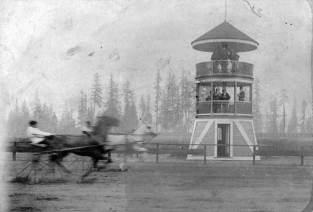 A harness racer sprints on Vancouver's racetrack in 1898, speeding by the judging stand designed by O.M. Hidden. The track opened in 1892 and operated on and off until 1911. In 1913, local racing started a second time at the old fairgrounds east of Burnt Bridge Creek in today's Bagley Downs neighborhood.