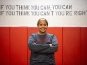 Prairie freshman Faith Tarrant stands in the wrestling room of Prairie High School. Tarrant recently won the 235-pound state championship.