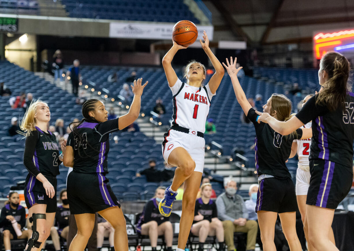 Camas' Reagan Jamison rises up for a shot in a 4A State Girls Basketball consolation game on  Friday, March 4, 2022, at the Tacoma Dome.