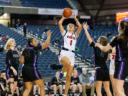 Camas' Reagan Jamison rises up for a shot in a 4A State Girls Basketball consolation game on  Friday, March 4, 2022, at the Tacoma Dome.