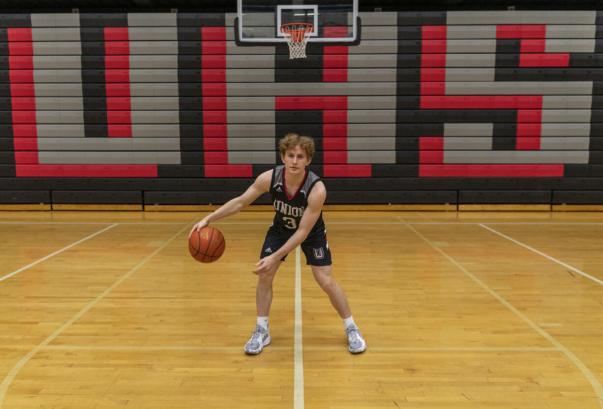 Union senior Bryson Metz stands for a portrait Wednesday, March 16, 2022, at the Union High School gym. Metz is The Columbian's All-Region boys basketball player of the year.