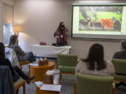 Colleen Storey of the No One Dies Alone program speaks to volunteers during a training session at Hope Bereavement Services on Monday morning.  The purpose of the program is to provide a reassuring presence at the bedside of a dying individual who would otherwise be alone.