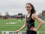Prairie's Kara Mattson pauses for a moment to pose for a portrait at the Tiger Invite on Saturday, March 26, 2022, at Battle Ground High School.