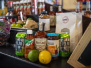 Bloody Mary ingredients sit on a table Tuesday at OMW Uptown Market.