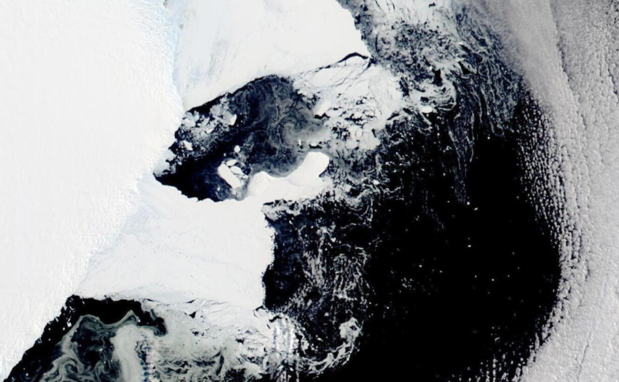 This satellite image provided by NASA, Aqua MODIS 12 in March 2022 shows the main piece of C-37 close to Bowman Island.  Scientists are concerned because an ice shelf the size of New York City collapsed in East Antarctica, an area that had long been thought to be stable. The collapse last week was the first time scientists have ever seen an ice shelf collapse in this cold area of Antarctica.